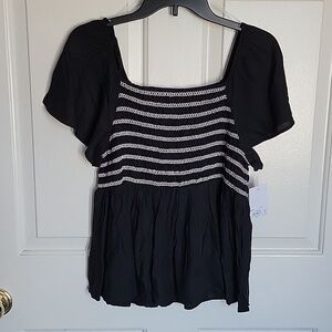 Women's black and white short sleeved shirt by SO, large. NWT.